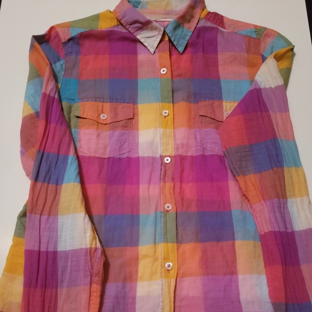 We are selling a button down shirt with plaid.